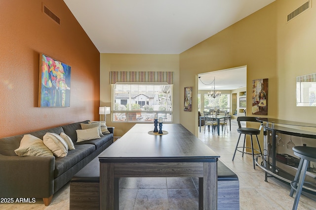20454 N Palm Canyon Dr, Surprise, AZ 85374 - living area with visible vents, an inviting chandelier, and light tile patterned floors