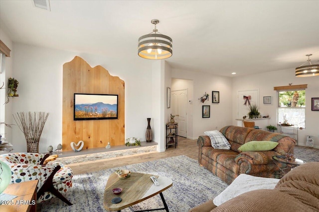 living room with a notable chandelier