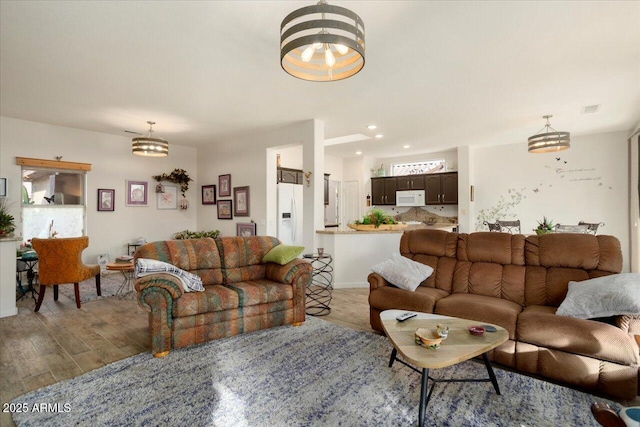 living room featuring light hardwood / wood-style flooring