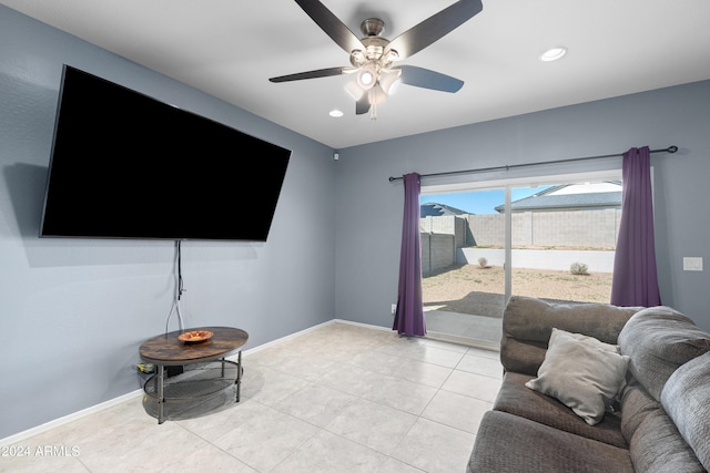 tiled living room featuring ceiling fan