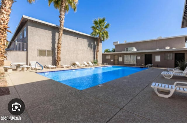 view of pool with a patio