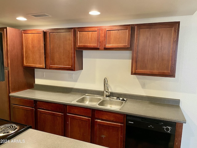 kitchen with cooktop, sink, and black dishwasher