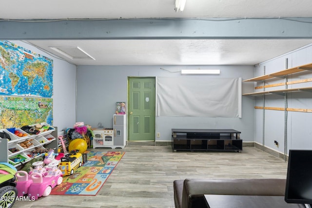 game room featuring light hardwood / wood-style floors