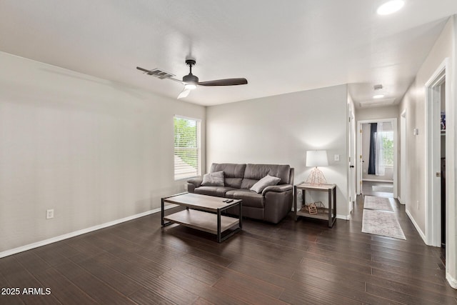 13420 W Berridge Ln, Litchfield Park, AZ 85340 - living area with a ceiling fan, healthy amount of natural light, and baseboards