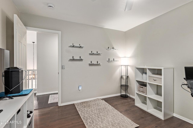 13420 W Berridge Ln, Litchfield Park, AZ 85340 - interior space with dark wood-type flooring and baseboards