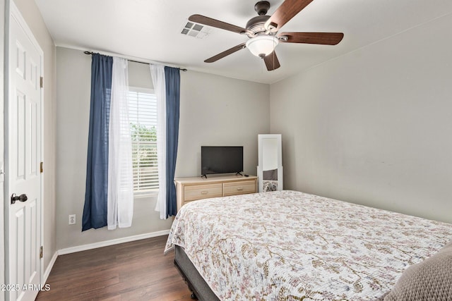13420 W Berridge Ln, Litchfield Park, AZ 85340 - bedroom with dark wood finished floors, baseboards, and ceiling fan