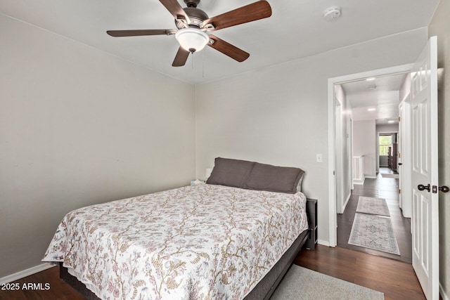 13420 W Berridge Ln, Litchfield Park, AZ 85340 - bedroom with wood finished floors, baseboards, and ceiling fan