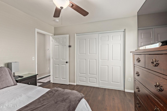 13420 W Berridge Ln, Litchfield Park, AZ 85340 - bedroom with dark wood finished floors, baseboards, a closet, and ceiling fan