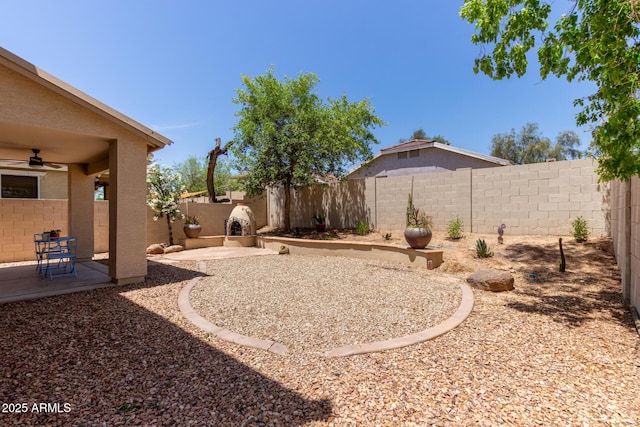 13420 W Berridge Ln, Litchfield Park, AZ 85340 - fenced backyard featuring ceiling fan and a patio