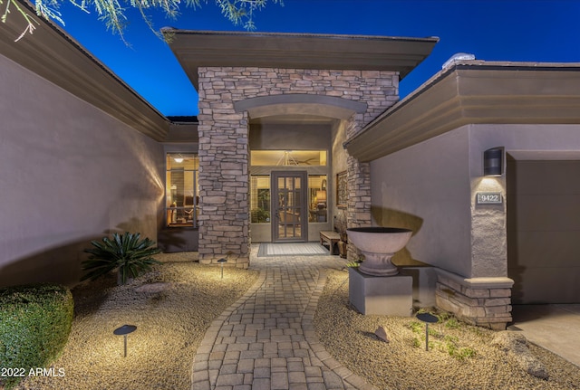 entrance to property featuring french doors