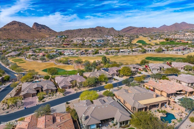 birds eye view of property featuring a mountain view