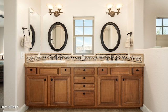 17665 N 93rd Way, Scottsdale, AZ 85255 - bathroom featuring double vanity and baseboards