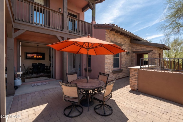 17665 N 93rd Way, Scottsdale, AZ 85255 - view of patio with a balcony and outdoor dining space