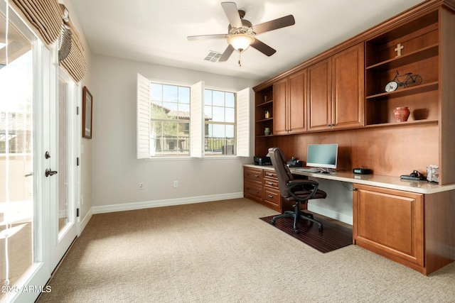 17665 N 93rd Way, Scottsdale, AZ 85255 - office featuring built in study area, baseboards, a ceiling fan, and light colored carpet