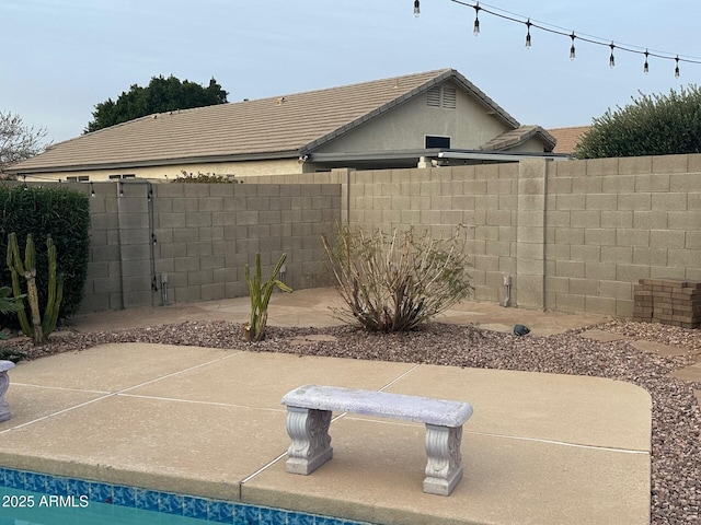 view of patio with a fenced backyard