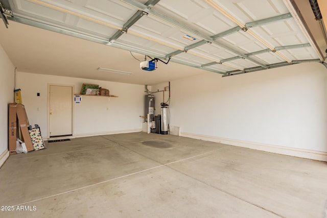 garage featuring water heater and a garage door opener