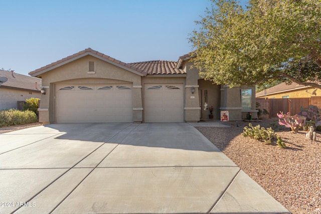 view of front of property with a garage