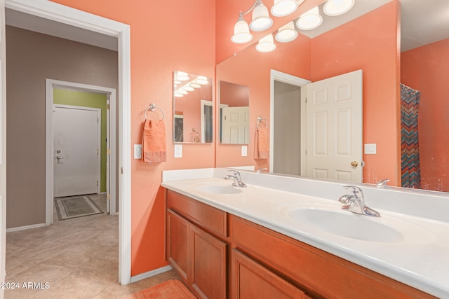 bathroom featuring tile patterned floors and vanity