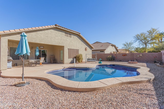 view of pool with a patio