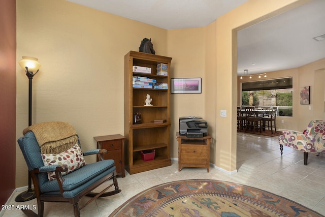 living area with light tile patterned flooring