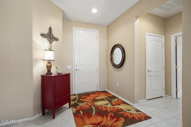 view of tiled foyer entrance