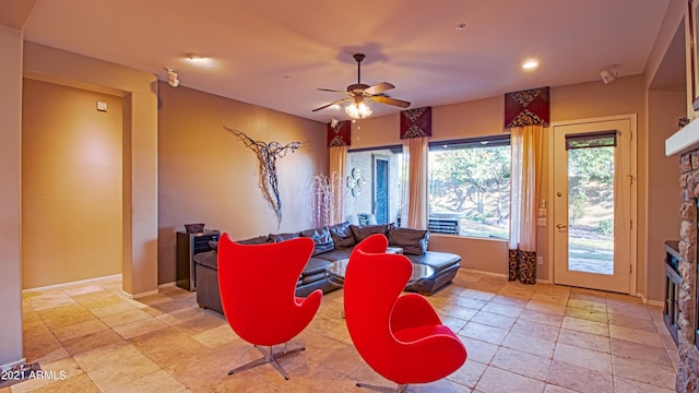 living room with ceiling fan