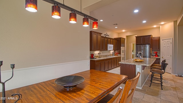 dining room featuring sink