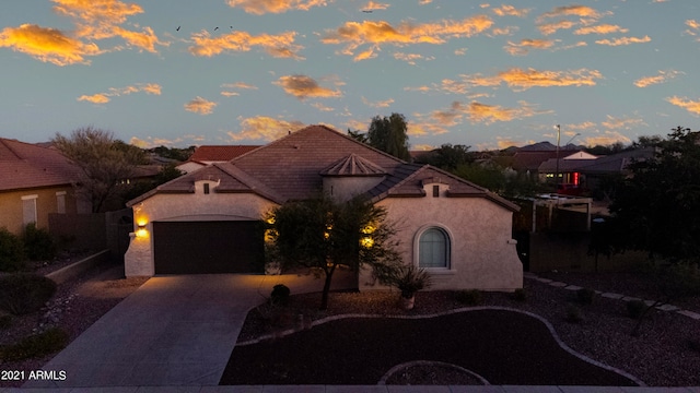 view of front of home with a garage