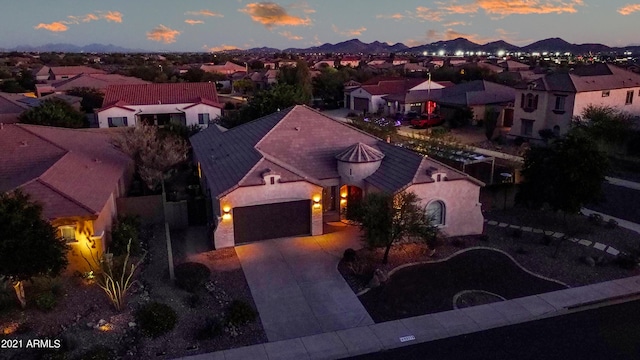 aerial view at dusk with a mountain view