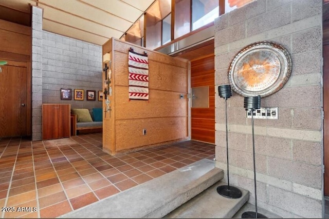25232 N Horseshoe Trl, Scottsdale, AZ 85255 - hall featuring tile patterned flooring and wood walls