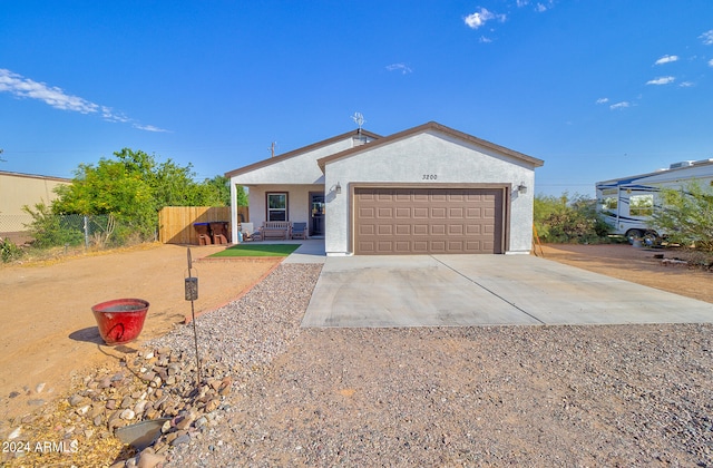 single story home with a garage