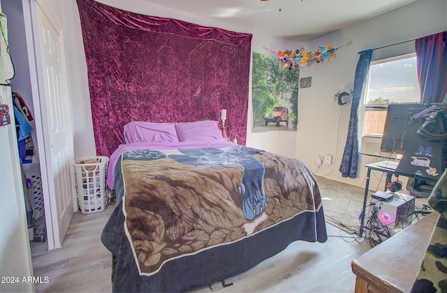 bedroom featuring light hardwood / wood-style floors