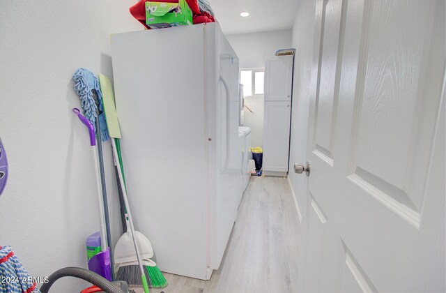 corridor featuring light hardwood / wood-style flooring