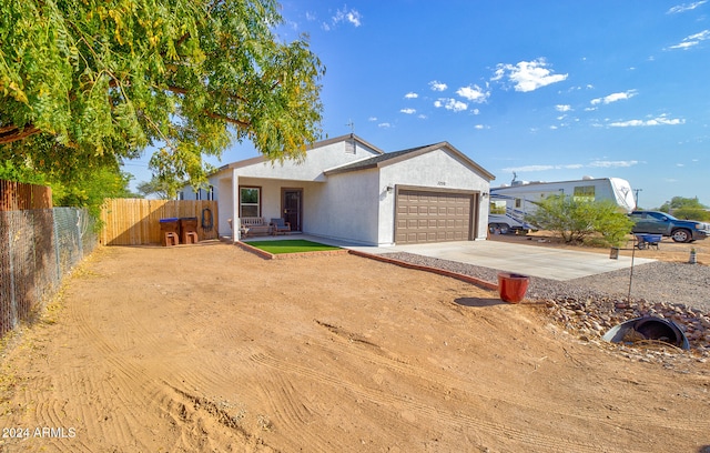 single story home featuring a garage