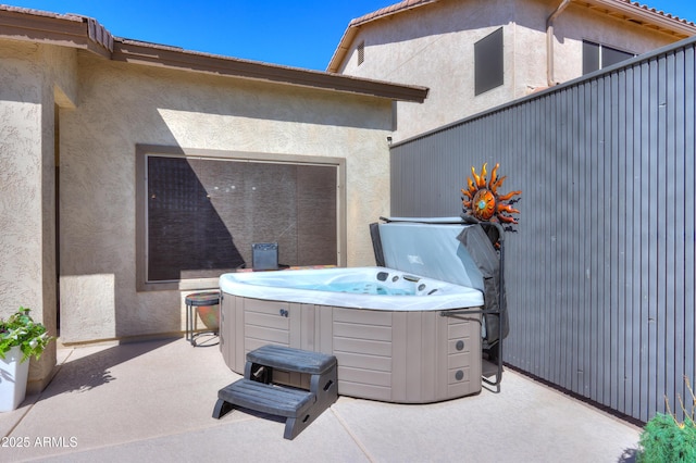 view of patio featuring a hot tub