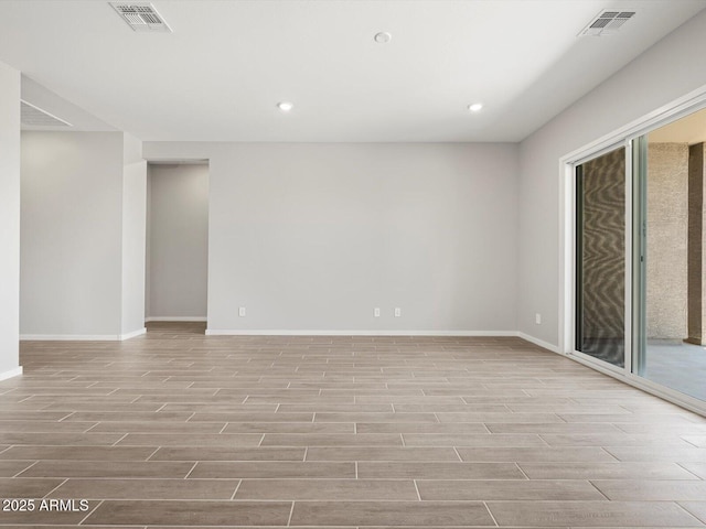 17561 W Pierson St, Goodyear, AZ 85395 - empty room with wood finished floors, baseboards, and recessed lighting