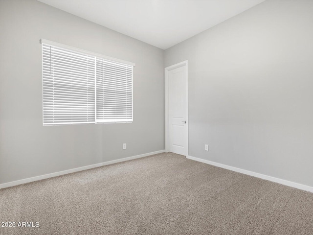17561 W Pierson St, Goodyear, AZ 85395 - carpeted empty room featuring baseboards
