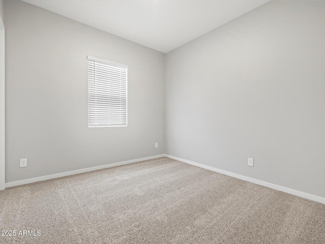 17561 W Pierson St, Goodyear, AZ 85395 - unfurnished room featuring carpet and baseboards