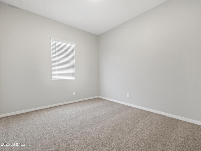 17561 W Pierson St, Goodyear, AZ 85395 - carpeted empty room with baseboards