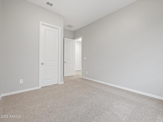 17561 W Pierson St, Goodyear, AZ 85395 - unfurnished bedroom with light colored carpet and baseboards