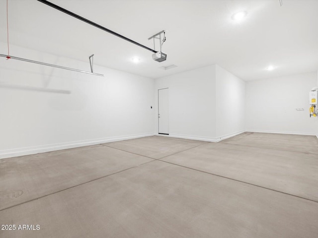 17561 W Pierson St, Goodyear, AZ 85395 - garage featuring recessed lighting, baseboards, and a garage door opener