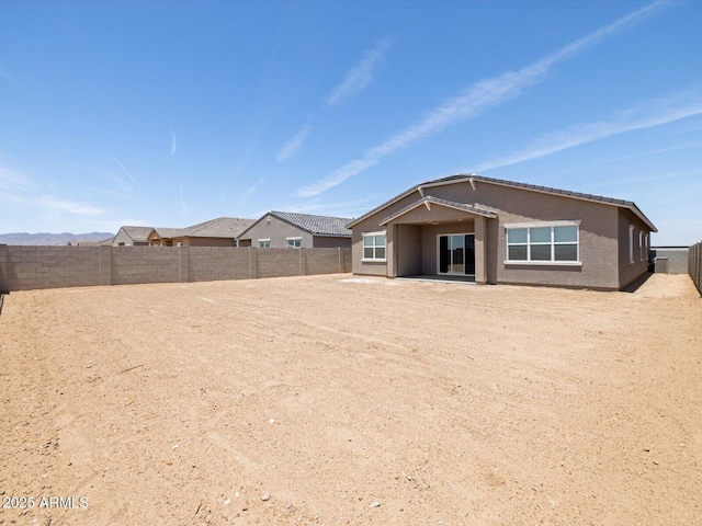17561 W Pierson St, Goodyear, AZ 85395 - back of property featuring a fenced backyard and stucco siding