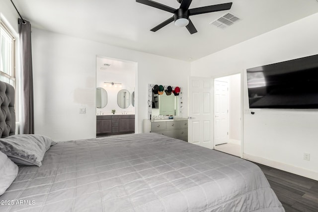 3715 S 57th Ln, Phoenix, AZ 85043 - bedroom with wood finished floors, ensuite bath, and ceiling fan