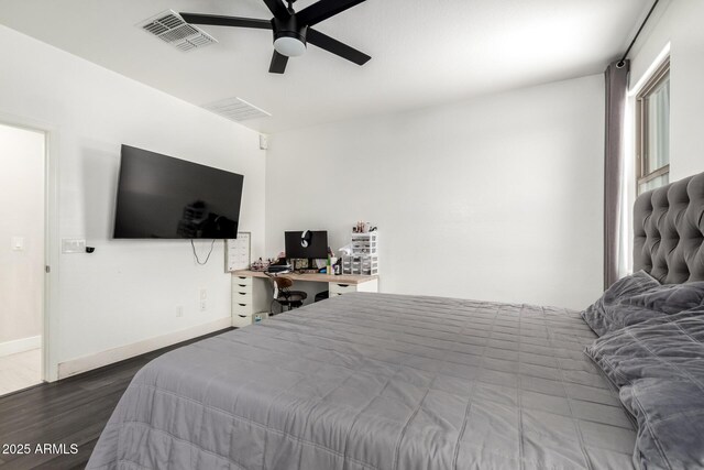 3715 S 57th Ln, Phoenix, AZ 85043 - bedroom featuring wood finished floors, ceiling fan, and a desk