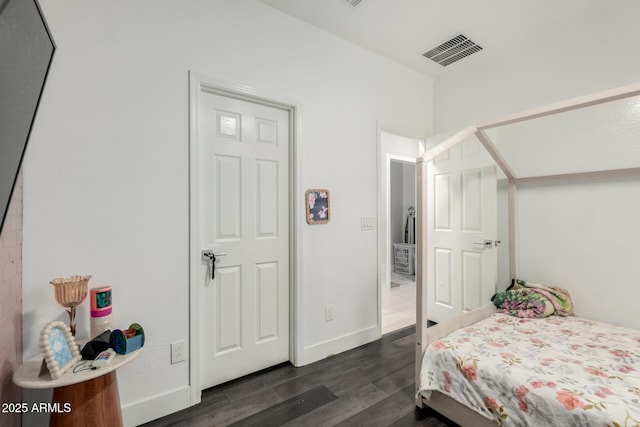 3715 S 57th Ln, Phoenix, AZ 85043 - bedroom with dark wood-style floors and baseboards