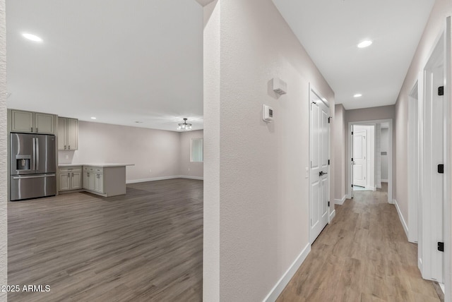 hall with light wood-type flooring