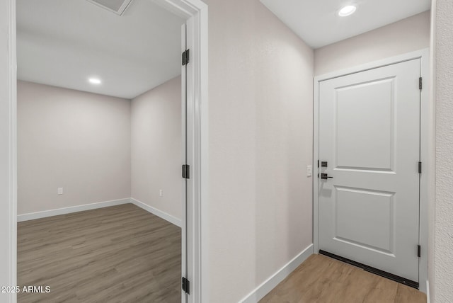 doorway to outside featuring light hardwood / wood-style floors