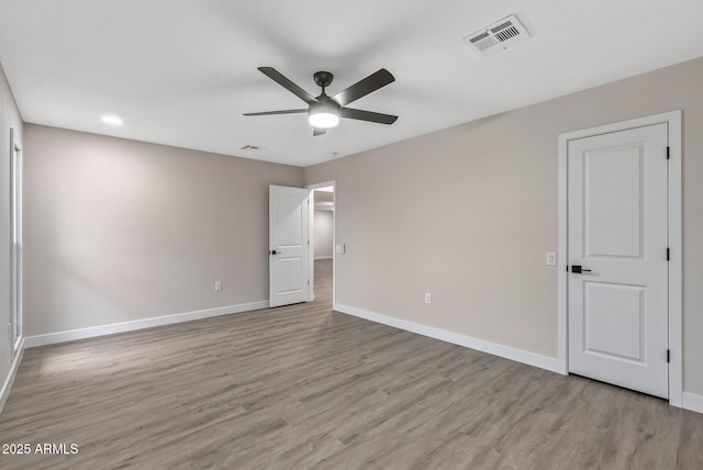 unfurnished bedroom featuring light hardwood / wood-style floors and ceiling fan