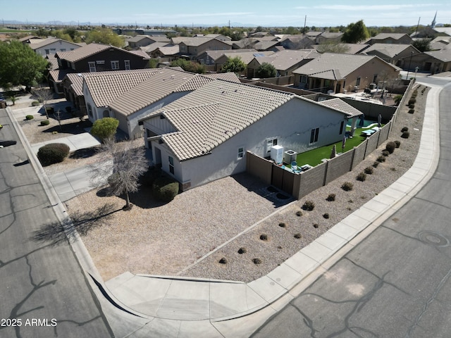 birds eye view of property with a residential view