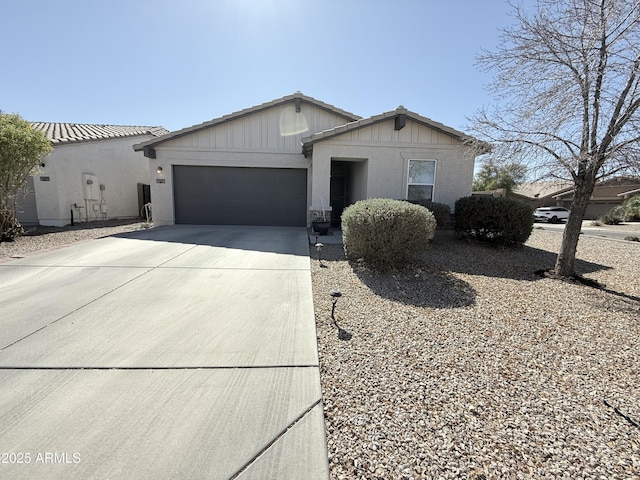 view of front of property with a garage and driveway